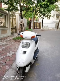 Cần bán xe spacy 125cc nhập khẩu, màu trắng, đời 2009, đời chót sm 222 