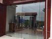Cửa kính thủy lực bản lề sàn cho mặt tiền đẹp