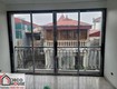 Cửa đi nhôm xingfa mở trượt 2 cánh cho nhà phố