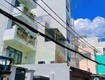 Bán nhà mặt tiền   7 tầng đúc   thang máy cảm ứng...