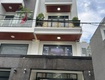 Nhà mặt tiền tl15   1 trệt 1 lửng 2 lầu sân thượng view...