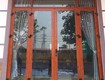 Mẫu cửa nhôm kính giả gỗ 4 cánh đẹp nổi bật 