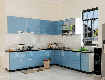 Tủ bếp acrylic an cường bóng gương màu xanh cao cấp
