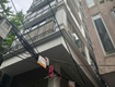 Nhà trần đại nghĩa 7t thang máy lô góc 2 thoáng ô tô tránh 10m...