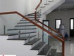 Top 10 mẫu cầu thang kính tay vịn gỗ đẹp cho biệt thự 