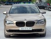 Bmw 750li xdrive f02 2009 vàng cát mỹ