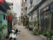 Nhà 2 mặt hẻm xe hơi   cách quang trung 40m    f8  ...