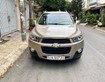 1 Ần bán chiếc Chevrolet Captiva LTZ 2014, số tự động, màu vàng ghi.