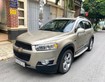 2 Ần bán chiếc Chevrolet Captiva LTZ 2014, số tự động, màu vàng ghi.