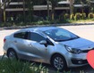 1 Xe Kia Rio Bạc- lăn bánh 2016