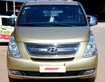 Hyundai Grand Starex 2.5MT ghế xoay đời 2010, màu vàng, nhập, 65.000km