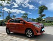 2 Tôi bán Toyota Wigo 2019, số sàn, màu cam.