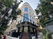 Bán tòa nhà VP khu phố Trần Duy Hưng Dt 150m2 Mt 10m lô góc. Giá 50 tỷ...