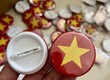 Huy hiệu nhựa cài ba lô 