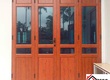 Địa chỉ thi công cửa nhôm kính giả gỗ chất lượng cao 