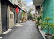 Cần bán nhà rộng gần 50m2, hẻm trải nhựa đẹp, ô tô cửa ngay tại trung tâm Tân...