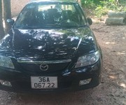 Cần bán xe mazda 323 sedan 2004 tích lương thái nguyên