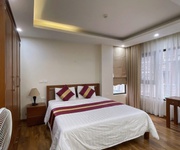 Bán tòa apartment trần thái tông - lô góc 140m  x 9t - ô tô tránh - dòng tiền 200tr/th