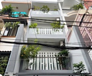 Nhà 4 tầng 50m  huỳnh văn bánh hẻm xe tải tận nhà chỉ 8,9 đồng