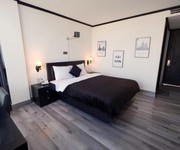 2 Mặt phố ba đình - khách sạn 7 tầng thang máy - vỉa hè rộng - 2 mặt thoáng - dòng tiền ổn định.