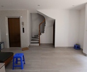 6 Em cần bán nhà phố Cát Linh 45 m2 xây 7 tầng thang máy mới xây ra phố 15 m giá 16 tỷ