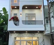 Cần bán gấp nhà 1 trệt 2 lầu   sổ hồng riêng, đường 7m, khu dân cư đông đúc