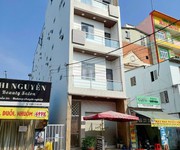 Bán tòa căn nhà chdv 30p mặt đường phan văn hớn q.12  5.3x33m  6 tầng