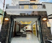 Nhà mới 2 tầng sân thượng nguyễn thị thập  p.bình thuận , q7