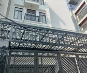 Nhà đẹp phúc lợi  4 tầng thang máy  gara oto  dt 88m - mt 5m  giá chỉ 15,x tỷ