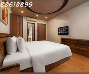 Bán mặt phố trần quốc vượng 131mx8t, mt 10,5m - thang máy - lô góc - dòng tiền 1.8 tỷ/năm