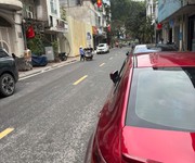 Mặt Phố Phó Đức Chính Ba Đình,6T thang máy 75m2 MT5m 52.8 tỷ