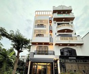 Nhà có tháng máy, 2 mặt tiền, hẻm xe hơi lê văn lương, hơn 13 tỷ