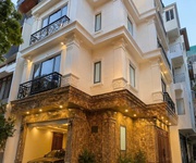 Bán nhà phố đỗ nhuận lô góc 66m ô tô vào nhà 7 tầng thang máy mặt tiền đẹp kd