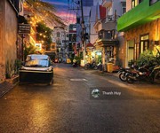 Chủ định cư- bán tòa khách sạn gần siêu thị emart phan văn trị - 5 tầng doanh thu 150triệu/tháng.