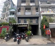 Bán tòa nhà vp - chdv gần emart phan văn trị hầm 6 tầng 1350m2 sàn