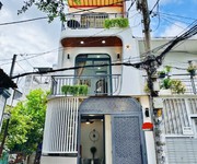 Nhà đẹp ngay chợ cây quéo phú nhuận hxh 4pn có phòng trệt - 5 tỷ 980