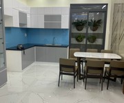 1 Nhà mới xây. Đường 6m.4pn sân thượng giá 4 tỷ 450 kế bên phú mỹ hưng
