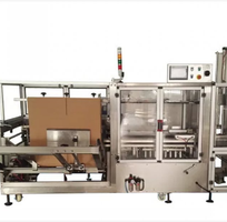1 Máy tự động đưa liệu và dán thùng Carton