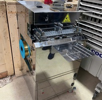 Máy buộc đầu túi có xếp hình, máy buộc túi bánh sanwich, máy buộc túi bánh mỳ ngọt Máy buộc đầu túi có xếp hình, máy buộc túi bánh sanwich, máy buộc túi bánh mỳ ngọt