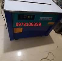 Máy đóng đai thùng carton, máy quấn dây đai, máy đóng kiện hàng,máy đai niềng thùng