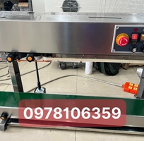 Máy hàn miệng túi liên tục cho túi có dịch nước, máy ép bao bì liên tục có in date, máy bao nilong