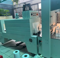 1 Máy cắt dán và rút màng co PE cho lốc chai lon, máy màng co PE lốc chai nước