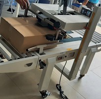 Máy dán băng keo thùng carton, máy dán thùng mặt trên mặt dưới, máy dán băng dính thùng