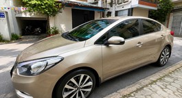 CHÍNH CHỦ CẦN BÁN XE KIA K3 AT 1.6 MÀU VÀNG CÁT
