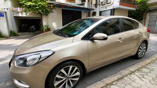 Chính chủ Cần bán xe kia k3 AT 1.6 màu vàng cát 