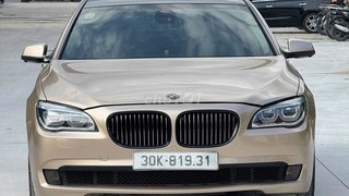 BMW 750Li xDrive F02 2009 Vàng cát Mỹ 