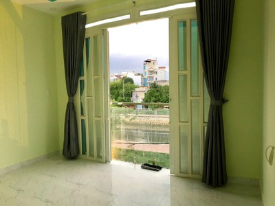 Bán nhà MT đường Ụ Cây, P10, Q8, 52m2, 1T2L sân thượng, SHR, 5,4 tỷ. 2