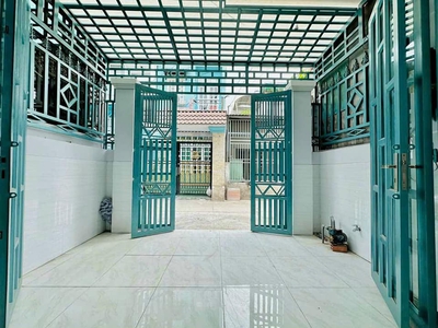 Bán nhà bình chánh 144m2 xã phạm văn hai 1 trệt 1 lầu đường vào 500m 0