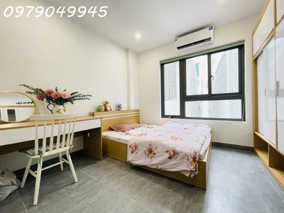 Bán nhà trọ nguyễn ngọc vũ 120m2x7t,mt 6m, 24pkk,thang máy, 30m oto, 17.9 tỷ 1