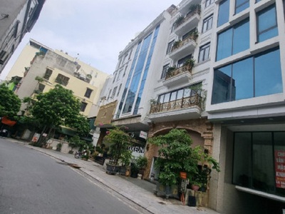 Cho thuê tòa nhà kính cạnh nhà hàng sen hồ 100m2 x 8 tầng, oto đỗ cửa 0
